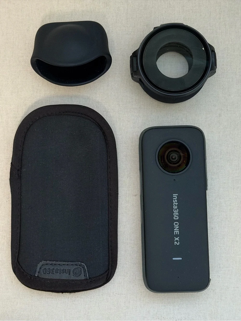 Insta360 X2 with accessories and case